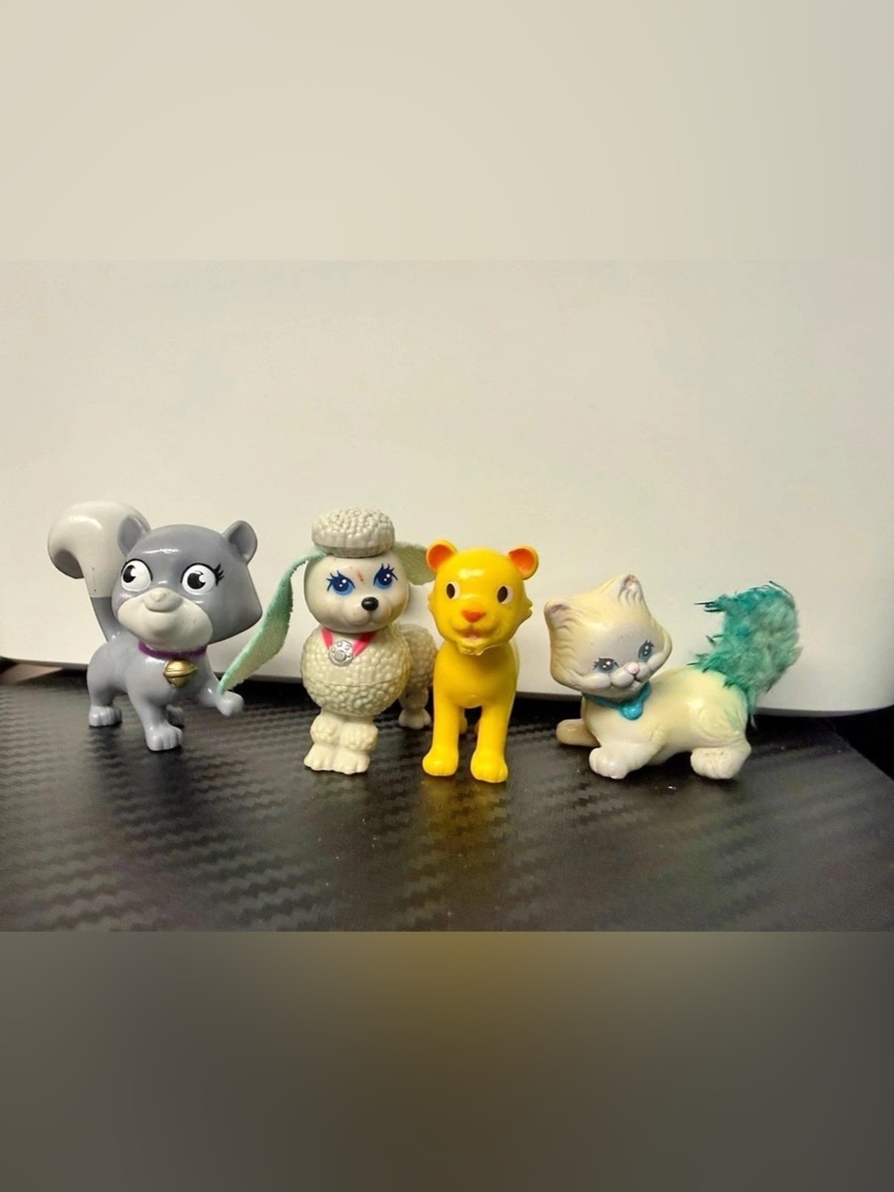 Four Animal Figures Yellow Gray